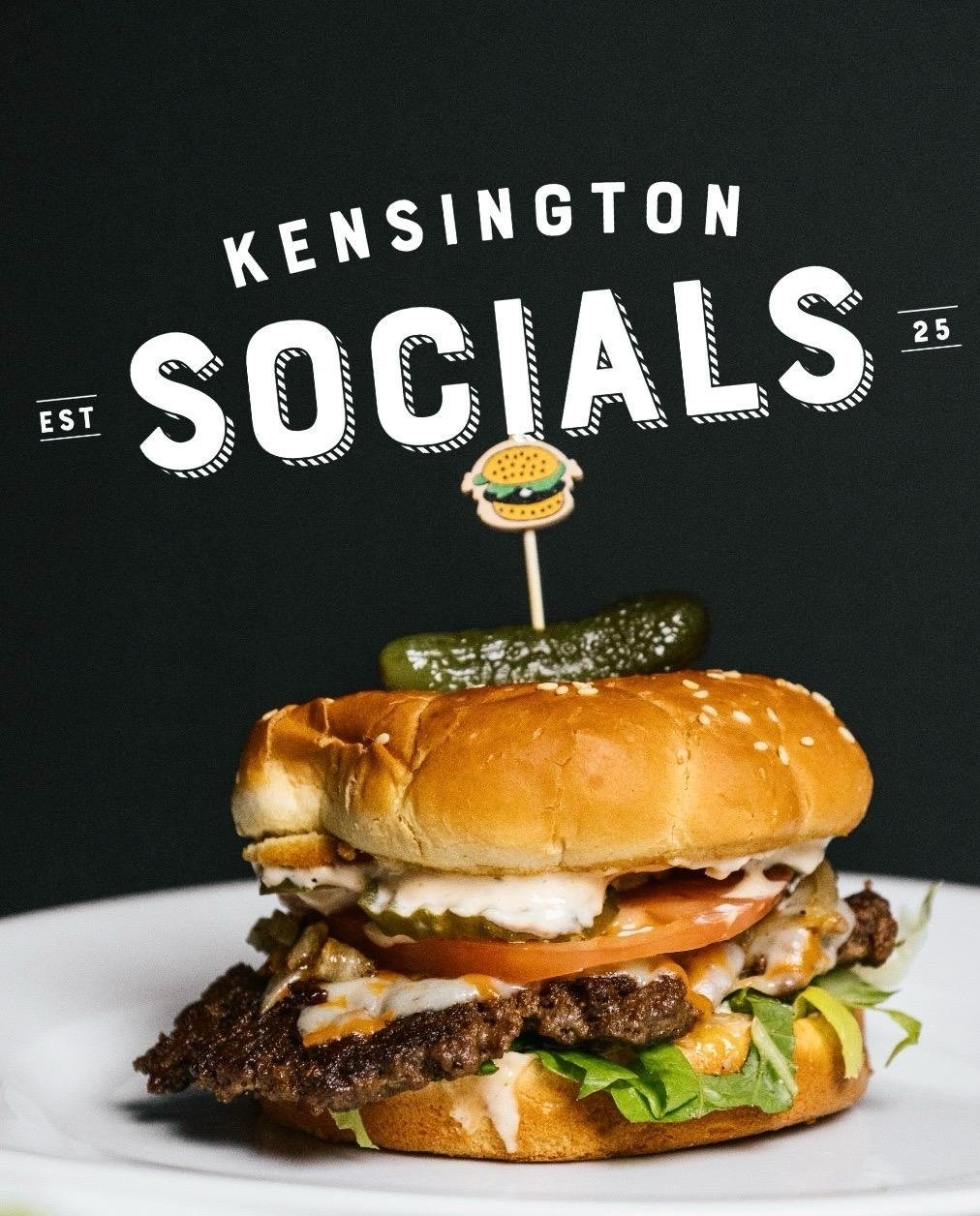 Gourmet burger and fries at Kensington Socials sports bar, Toronto